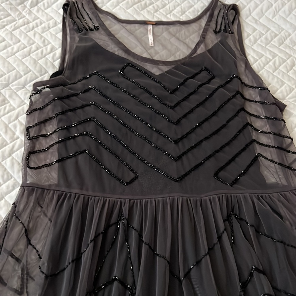 Free people beaded tunic dress with slip included. Size M. New never worn